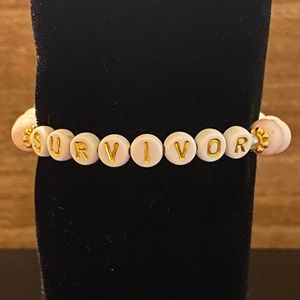 Handcrafted breast cancer survivor beaded bracelet